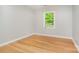 Bedroom featuring hardwood floors, natural light and neutral paint at 14834 Pawnee Trl, Matthews, NC 28104