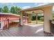 Spacious covered porch with composite decking and wooded views, great for entertaining at 14834 Pawnee Trl, Matthews, NC 28104