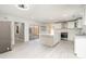 Modern kitchen with white cabinets, stainless steel appliances, and a spacious center island at 14834 Pawnee Trl, Matthews, NC 28104