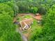 Aerial view of a secluded home, surrounded by trees, and a shed in the back at 1534 Buffalo Shoals Rd, Lincolnton, NC 28092