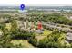 Desirable neighborhood featuring mature trees, manicured lawns, and picturesque lake views at 15431 Cimarron Hills Ln, Charlotte, NC 28278