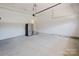 Spacious garage with ample room for vehicles, appliances, and other storage needs at 15431 Cimarron Hills Ln, Charlotte, NC 28278