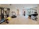 Spacious gym with workout machines and large windows for ample natural light at 15431 Cimarron Hills Ln, Charlotte, NC 28278