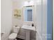 Elegant powder room with stylish fixtures and decor at 15431 Cimarron Hills Ln, Charlotte, NC 28278