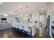 Bright, open kitchen features a large island with seating and modern stainless steel appliances at 15431 Cimarron Hills Ln, Charlotte, NC 28278