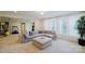 Bright living room with a comfortable sectional sofa, neutral carpet, and plenty of natural light at 15431 Cimarron Hills Ln, Charlotte, NC 28278