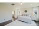 Serene main bedroom with tray ceiling and an en-suite bathroom at 15431 Cimarron Hills Ln, Charlotte, NC 28278
