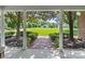Stunning backyard with lush greenery, manicured lawn, and a brick pathway view from the porch at 1721 White Pond Ln, Waxhaw, NC 28173
