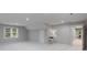 Spacious basement with large window, neutral paint and ample lighting at 1721 White Pond Ln, Waxhaw, NC 28173