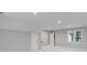 Spacious basement with large window, neutral paint and ample lighting at 1721 White Pond Ln, Waxhaw, NC 28173