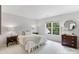 Bright bedroom with natural light, side tables, lamps and a comfortable bed at 1721 White Pond Ln, Waxhaw, NC 28173