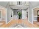 Elegant foyer with hardwood floors, a grand staircase, and an open, airy feel at 1721 White Pond Ln, Waxhaw, NC 28173