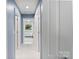 Hallway with multiple doors leading to other rooms in the house at 1721 White Pond Ln, Waxhaw, NC 28173