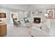 Cozy living room featuring a fireplace, comfortable seating, and neutral decor at 1721 White Pond Ln, Waxhaw, NC 28173