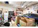 Well-organized garage with ample space for parking and storage, featuring shelves and a toolbox at 18027 Train Station Dr, Cornelius, NC 28031