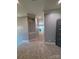Neutral upstairs hallway with neutral walls and carpet leads to private bedrooms at 19409 Laurel Glen Ave, Cornelius, NC 28031