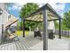 Backyard featuring a swing and canopy covered seating at 217 Almora Loop, Mooresville, NC 28115
