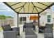 Backyard featuring seating and canopy covered seating at 217 Almora Loop, Mooresville, NC 28115
