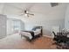 Carpeted bedroom featuring a ceiling fan and furniture at 217 Almora Loop, Mooresville, NC 28115