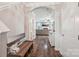 Inviting entryway with hardwood floors and views into the living space at 217 Almora Loop, Mooresville, NC 28115