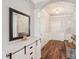 Inviting entryway with hardwood floors, console table, and modern lighting at 217 Almora Loop, Mooresville, NC 28115