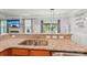 Kitchen with granite countertops and backyard view at 217 Almora Loop, Mooresville, NC 28115