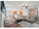 Open-concept living room with kitchen and dining areas; great for entertaining at 217 Almora Loop, Mooresville, NC 28115
