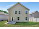 Back exterior of home with a grassy backyard at 2751 Bramble Ridge Ct, Charlotte, NC 28215
