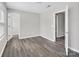 Light-filled bedroom with durable flooring, multiple entryways, and a neutral color palette at 2751 Bramble Ridge Ct, Charlotte, NC 28215