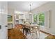 Bright breakfast nook with white cabinetry and ample natural light from the large window at 3134 Old Chapel Ln, Charlotte, NC 28210