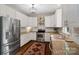 Modern kitchen with stainless steel appliances, granite countertops, and plenty of cabinet space at 3134 Old Chapel Ln, Charlotte, NC 28210