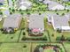 Aerial view of a home showcasing a landscaped backyard with a patio, mature trees, and privacy fencing at 3333 Oliver Stanley Trl, Lancaster, SC 29720