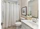 Bathroom with a shower, toilet, vanity with sink, and decorative artwork at 3333 Oliver Stanley Trl, Lancaster, SC 29720
