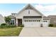 Charming home with a two-car garage and well-maintained landscaping in a modern color palette at 3333 Oliver Stanley Trl, Lancaster, SC 29720