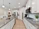 Bright kitchen features stainless steel appliances, granite countertops, and ample cabinet space at 3333 Oliver Stanley Trl, Lancaster, SC 29720