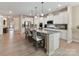 A kitchen boasts an expansive island with seating, stainless appliances and ample counterspace at 3333 Oliver Stanley Trl, Lancaster, SC 29720