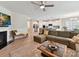 Open-concept living room with hardwood floors and easy access to the kitchen and dining area at 3333 Oliver Stanley Trl, Lancaster, SC 29720