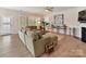 Spacious living room with hardwood floors, ceiling fan and plenty of natural light at 3333 Oliver Stanley Trl, Lancaster, SC 29720