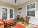 Covered porch with comfortable seating, a colorful rug, and an open view at 3333 Oliver Stanley Trl, Lancaster, SC 29720