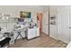 Well-lit room with sewing machines, storage, and a television for entertainment at 3333 Oliver Stanley Trl, Lancaster, SC 29720