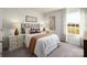 Cozy bedroom with neutral decor, natural light, and comfortable bedding at 414 Janie Nw Cir, Newton, NC 28658