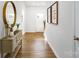 Bright entryway showcases hardwood floors and elegant decor at 414 Janie Nw Cir, Newton, NC 28658
