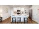 Modern kitchen with stainless steel appliances and center island with barstool seating at 414 Janie Nw Cir, Newton, NC 28658