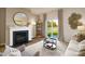 Inviting living room featuring a modern fireplace and lots of natural light at 414 Janie Nw Cir, Newton, NC 28658