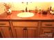 Stylish bathroom vanity with a unique sink, granite countertop, and decorative accessories, adding elegance at 425 Roselawn Pl, Charlotte, NC 28211