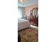 Bright bedroom features a dresser, plush carpet, and a cozy bed, creating a serene and welcoming atmosphere at 425 Roselawn Pl, Charlotte, NC 28211