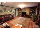 Spacious living room with built-in bookshelves and a cozy fireplace, perfect for relaxation at 425 Roselawn Pl, Charlotte, NC 28211