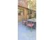 Relaxing outdoor patio with a dining table surrounded by lush landscaping at 425 Roselawn Pl, Charlotte, NC 28211