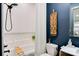 Stylish bathroom with a tub, shower, toilet, and vessel sink, featuring decorative accents and modern fixtures at 444 Starnes Circle Dr, Taylorsville, NC 28681