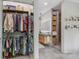 Walk-in closet leading to modern bathroom featuring a shower and stylish storage at 444 Starnes Circle Dr, Taylorsville, NC 28681